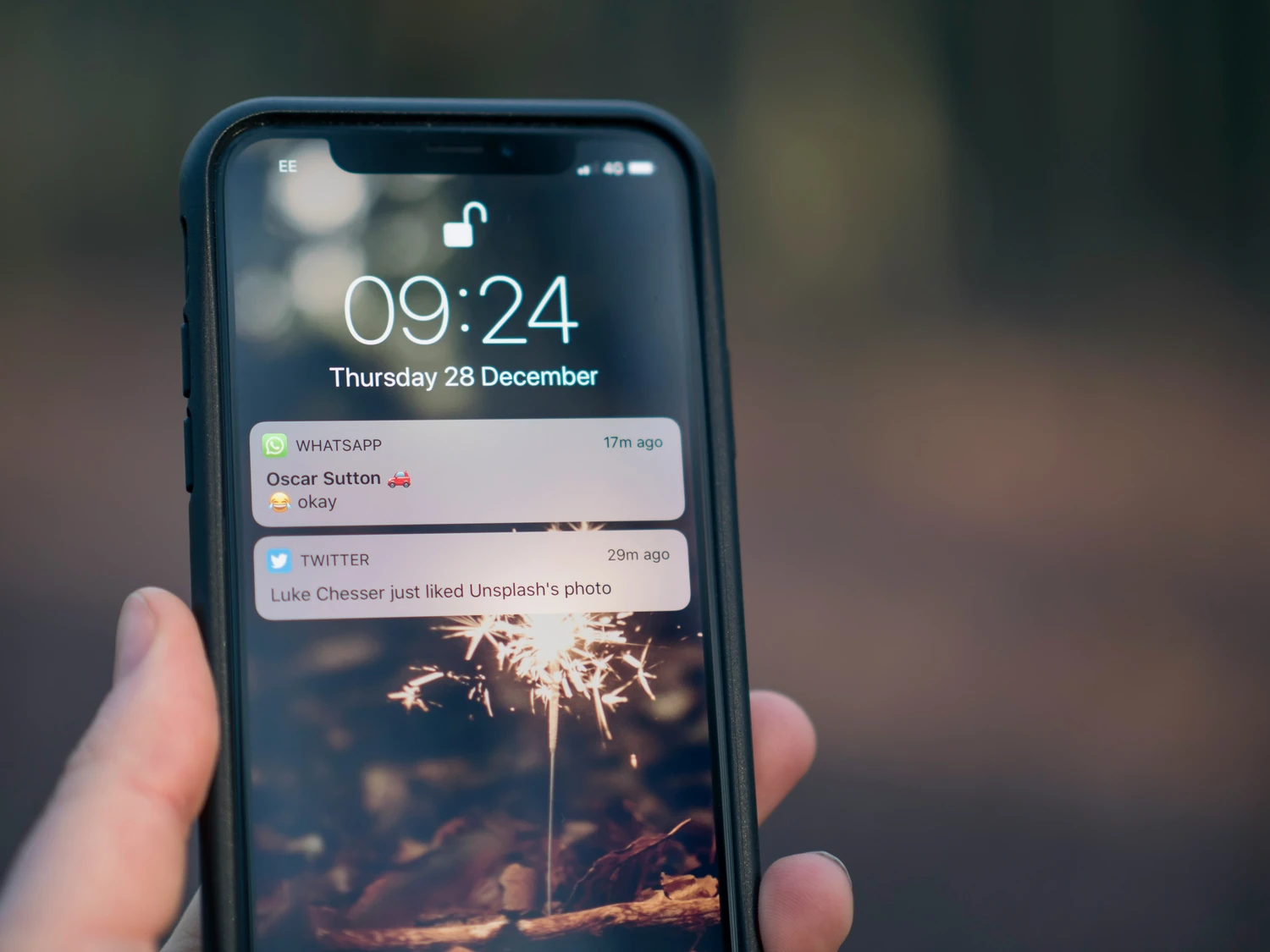 Smartphone lock screen displaying automated notifications