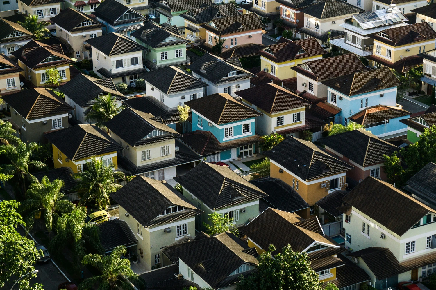 Aerial view of closely spaced homes in a residential neighborhood