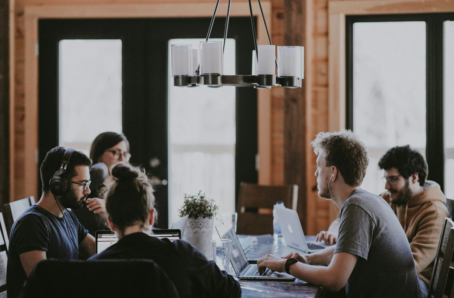 Local support team meeting around a table